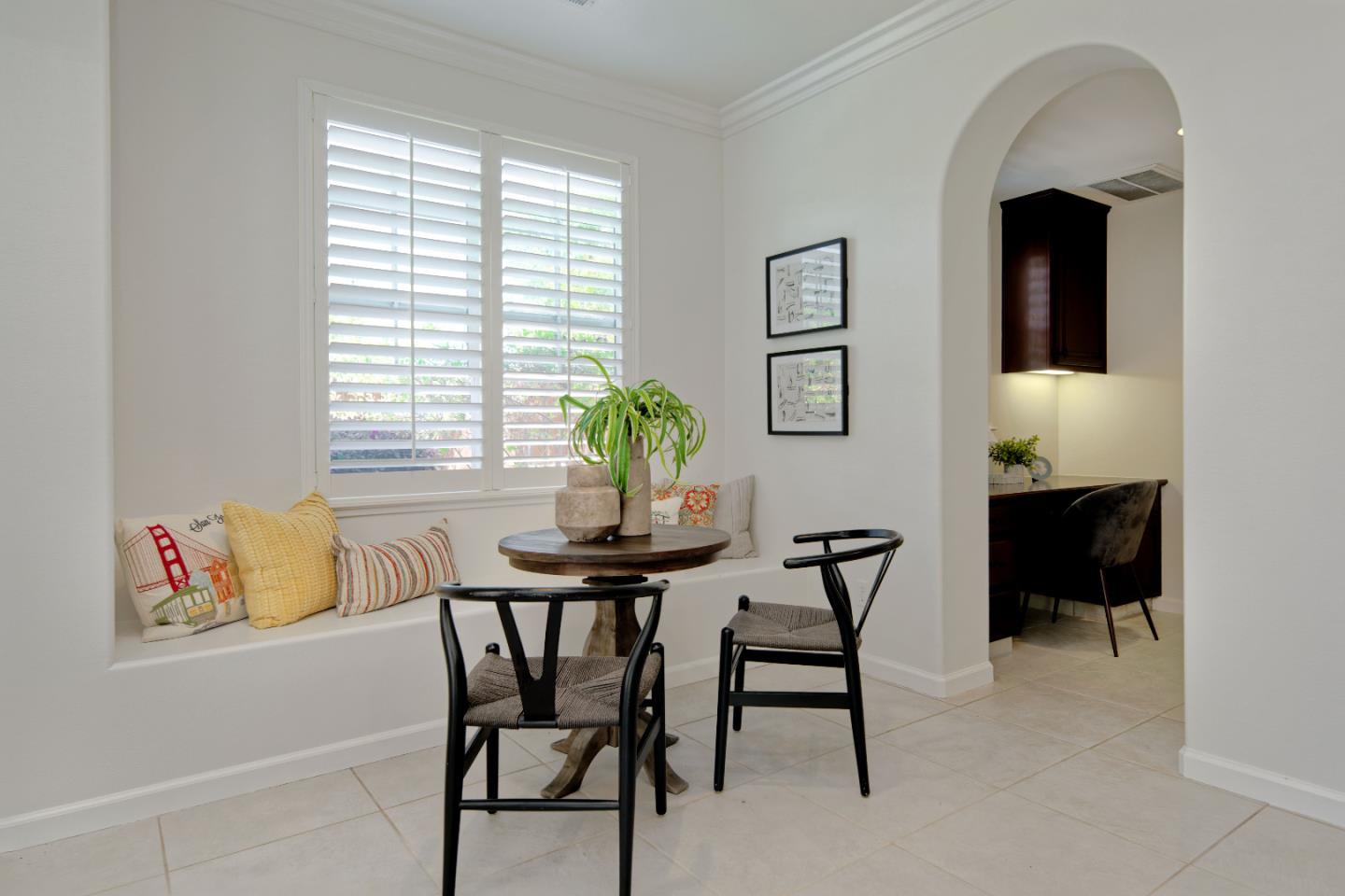 7160 Eagle Ridge Drive Gilroy, CA 95020 - Photo 18 of 80 a view of a dining room with furniture and a potted plant