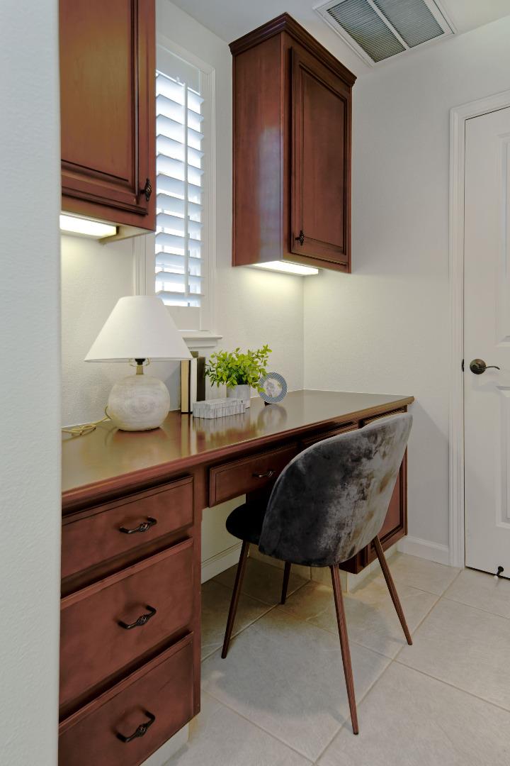 7160 Eagle Ridge Drive Gilroy, CA 95020 - Photo 20 of 80 a room with a table chair and a cabinet