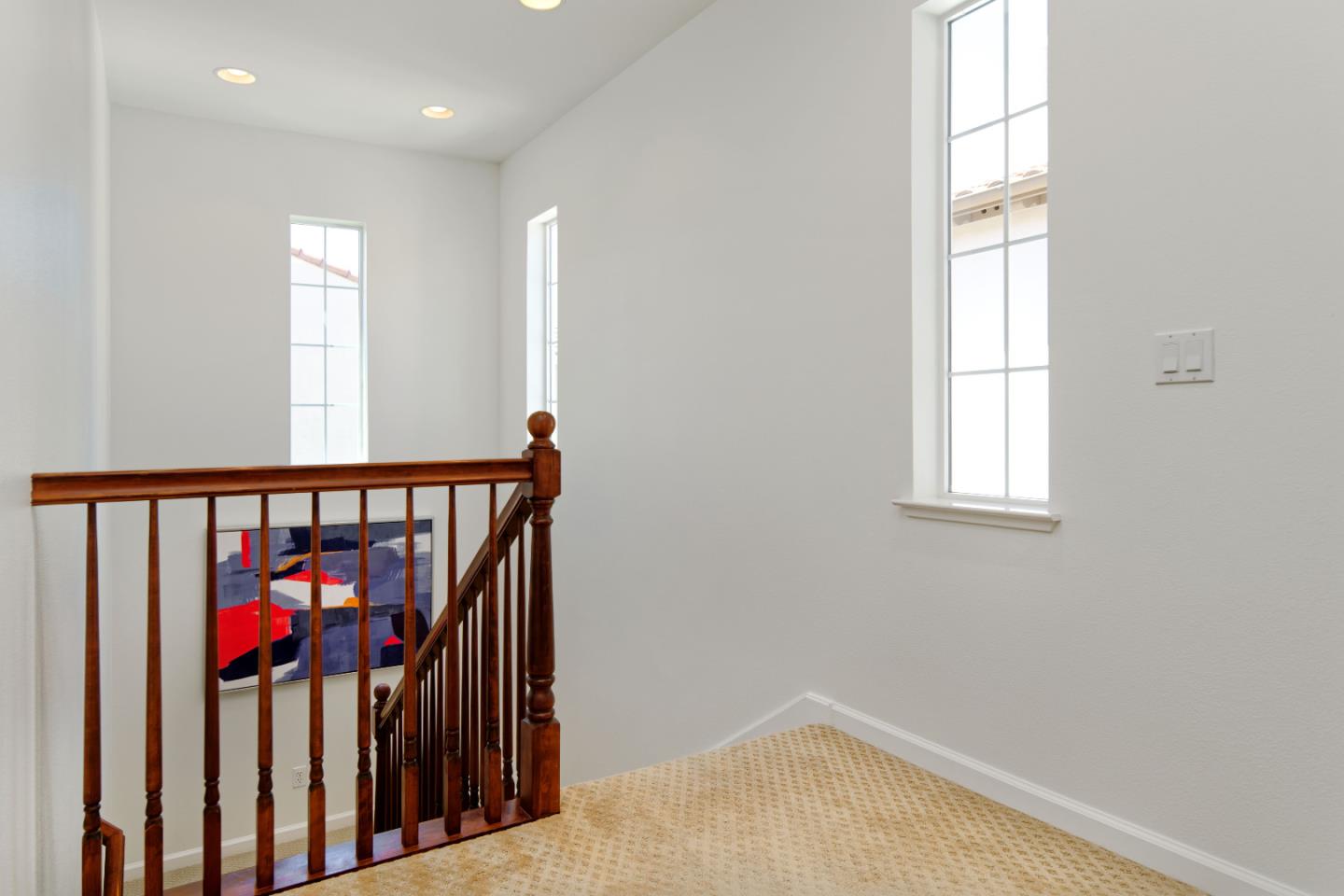 7160 Eagle Ridge Drive Gilroy, CA 95020 - Photo 24 of 80 a view of a hallway with a window
