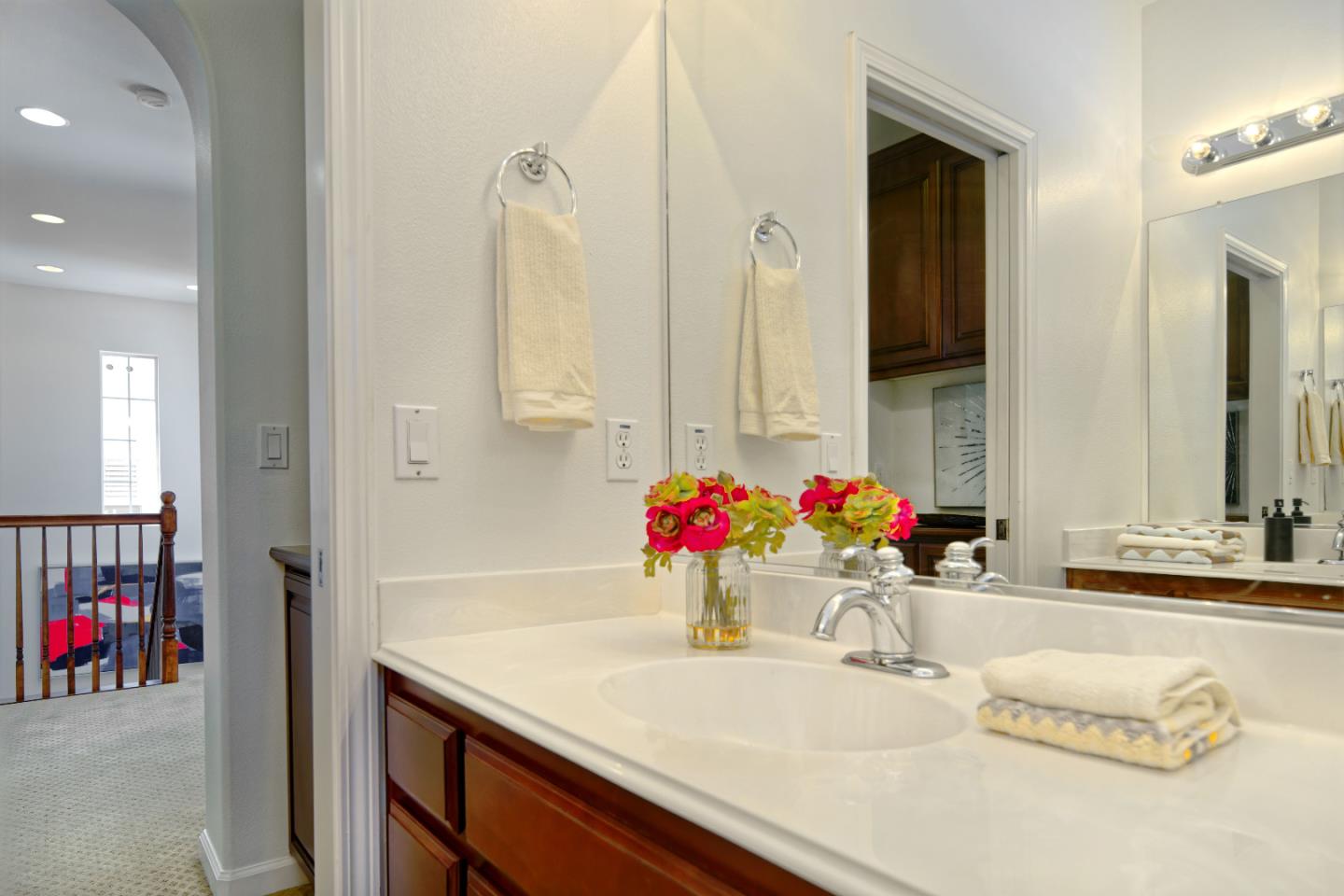 7160 Eagle Ridge Drive Gilroy, CA 95020 - Photo 29 of 80 a bathroom with a sink vanity and a mirror