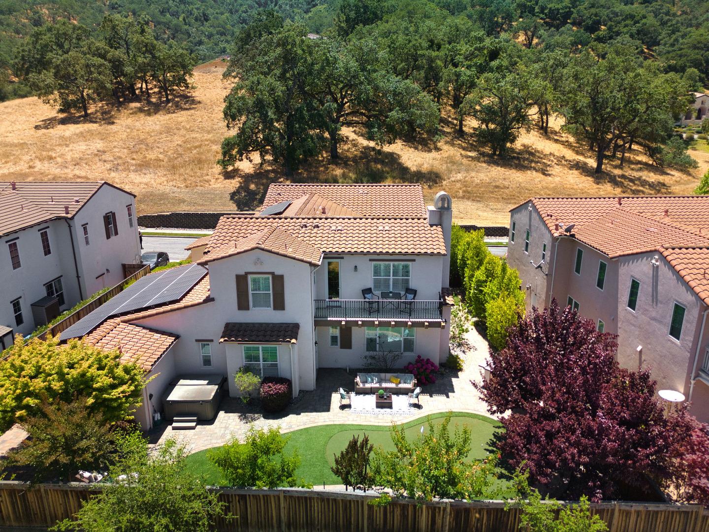 7160 Eagle Ridge Drive Gilroy, CA 95020 - Photo 66 of 80 an aerial view of a house with a garden and plants