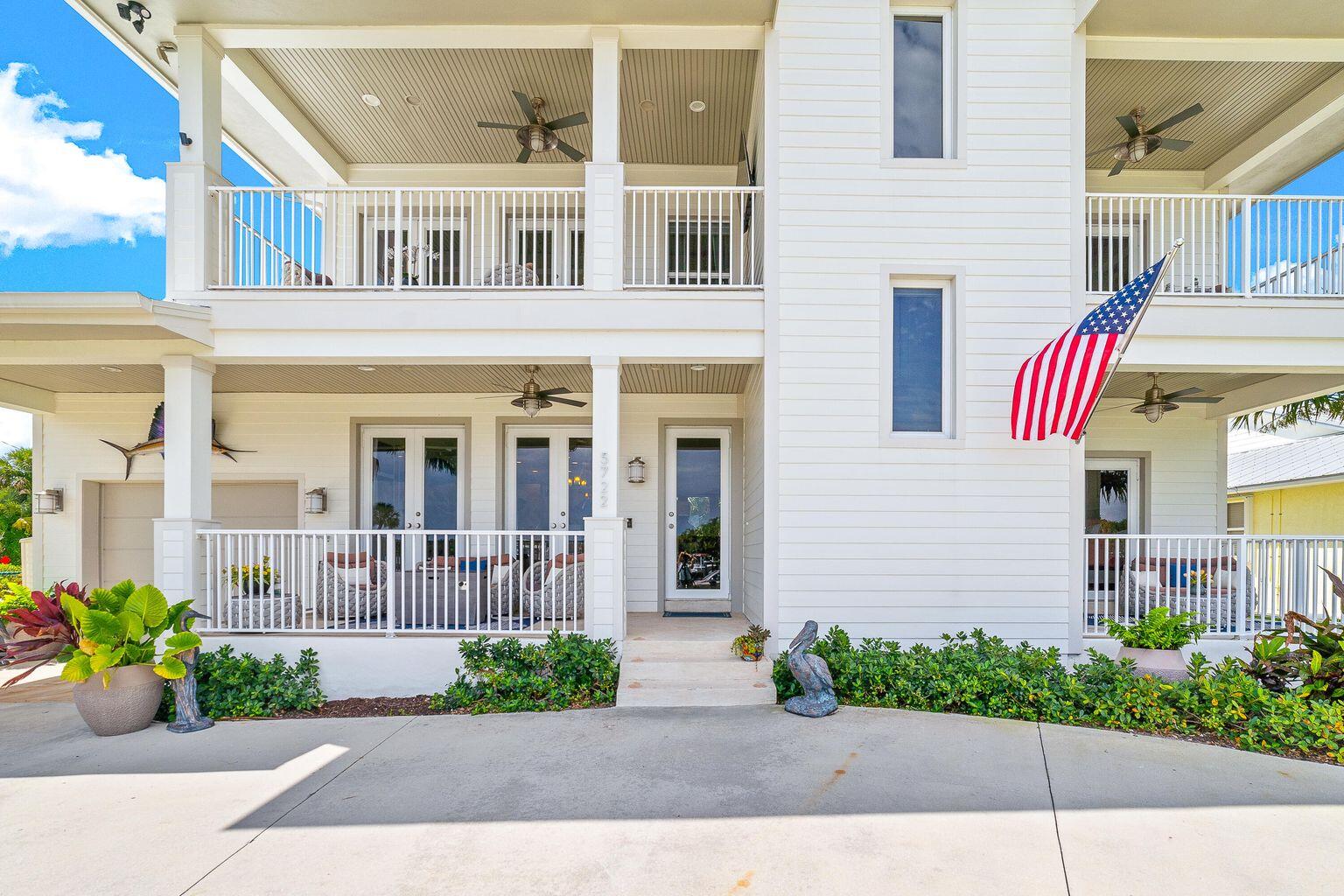 5722 Southeast Nassau Terrace Stuart, FL 34997 - Photo 2 of 51 Front of Home with 4 Balconies