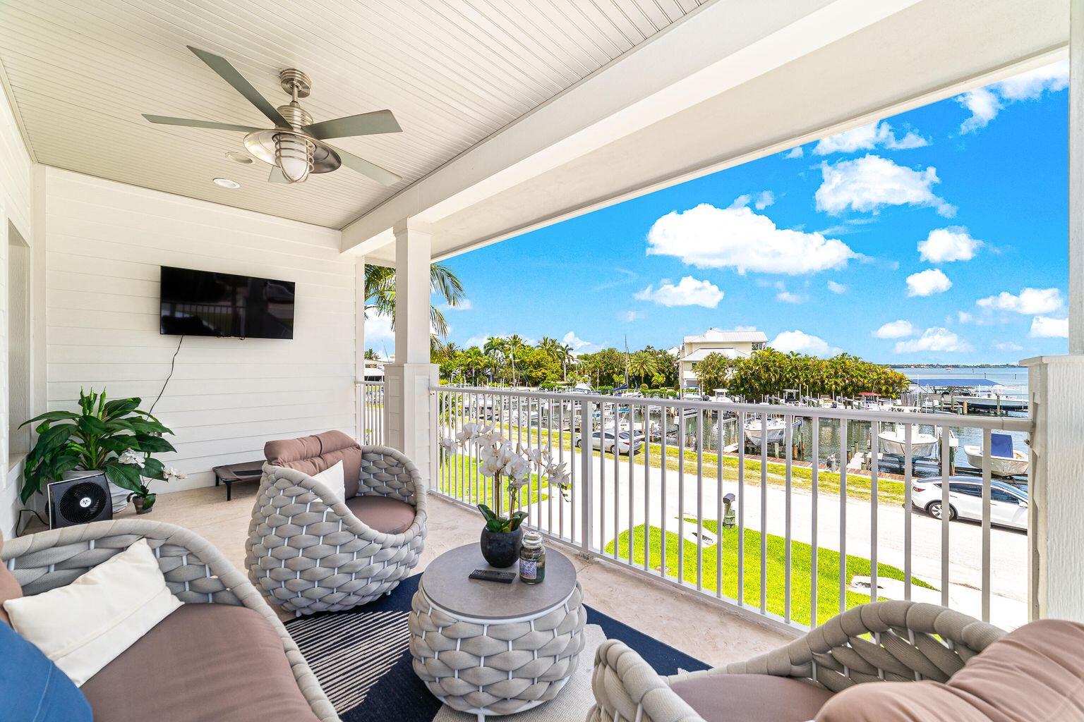 5722 Southeast Nassau Terrace Stuart, FL 34997 - Photo 34 of 51 Master Bedroom Balcony