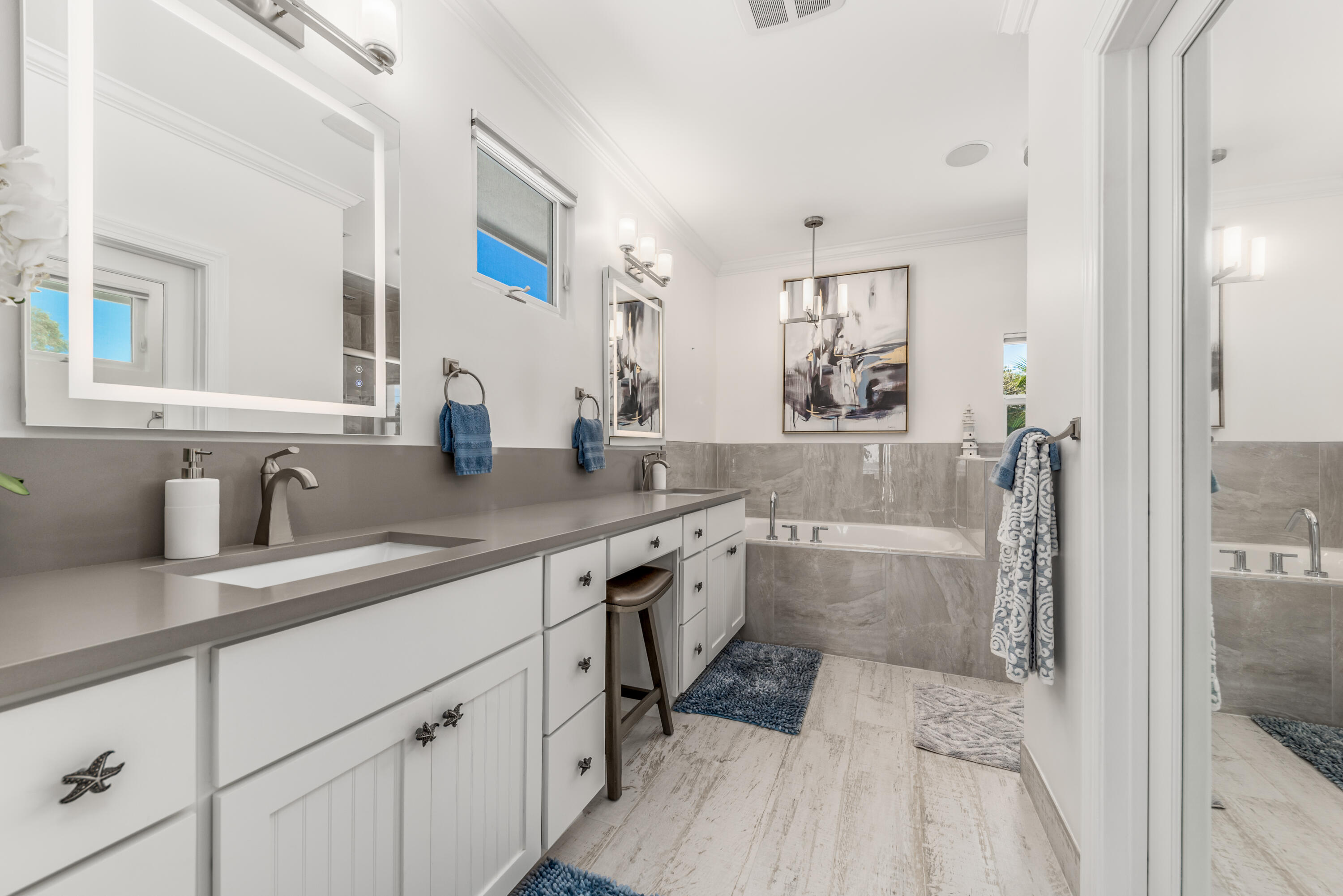 5722 Southeast Nassau Terrace Stuart, FL 34997 - Photo 37 of 51 Master Bathroom Vanity and Jacuzzi Tub