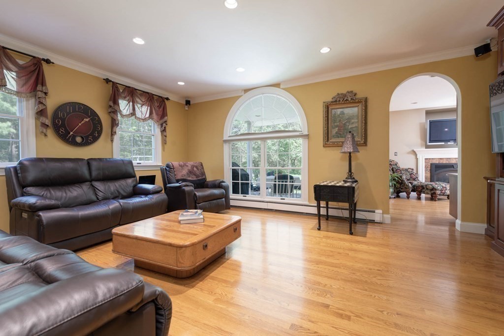 4 Elliston Road Weston, MA 02493 - Photo 14 of 36 a living room with furniture and a large window