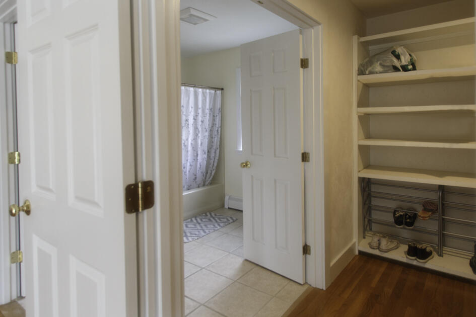488 Upper County Road Dennis Port, MA 02639 - Photo 21 of 35 a view of an empty room with working space and a window