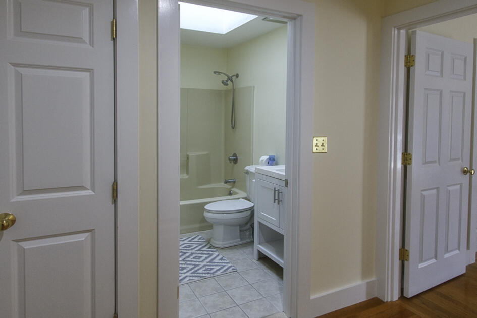 488 Upper County Road Dennis Port, MA 02639 - Photo 25 of 35 a bathroom with a toilet and a shower