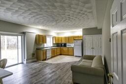 488 Upper County Road Dennis Port, MA 02639 - Photo 29 of 35 a view of kitchen with furniture and a refrigerator