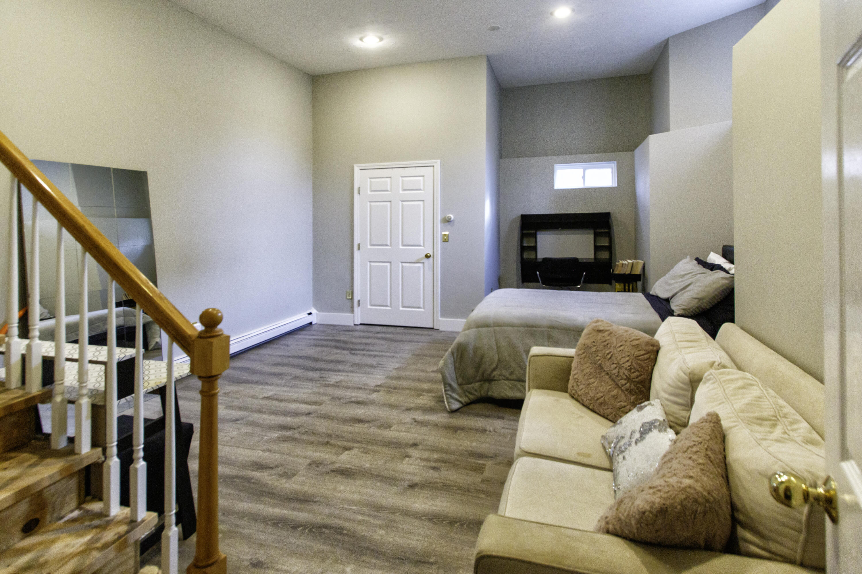 488 Upper County Road Dennis Port, MA 02639 - Photo 31 of 35 a bedroom with a bed and wooden floor