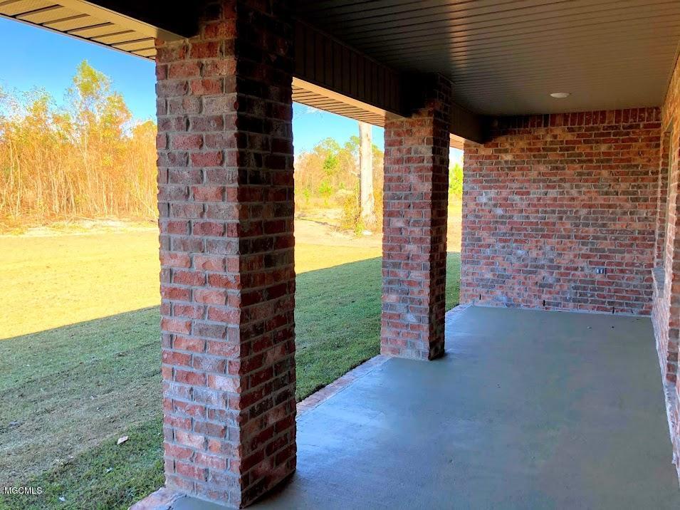 6226 Roxanne Way Biloxi, MS 39532 - Photo 12 of 18 Covered back porch