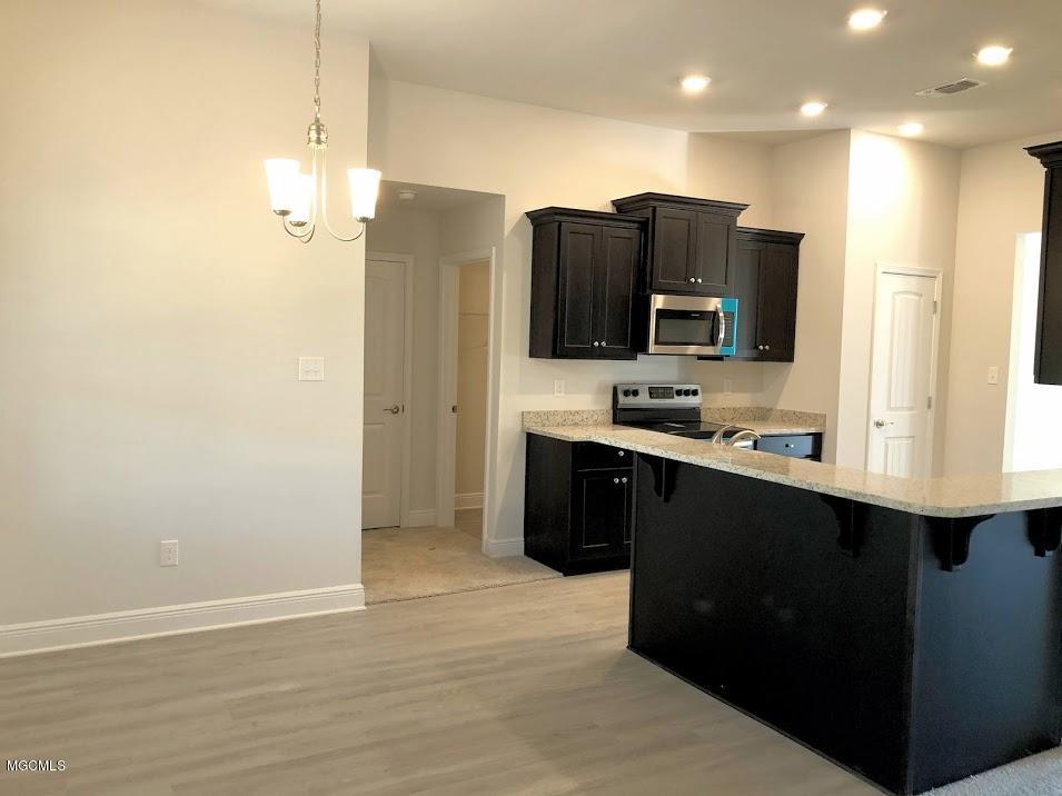 6226 Roxanne Way Biloxi, MS 39532 - Photo 6 of 18 Kitchen and breakfast nook