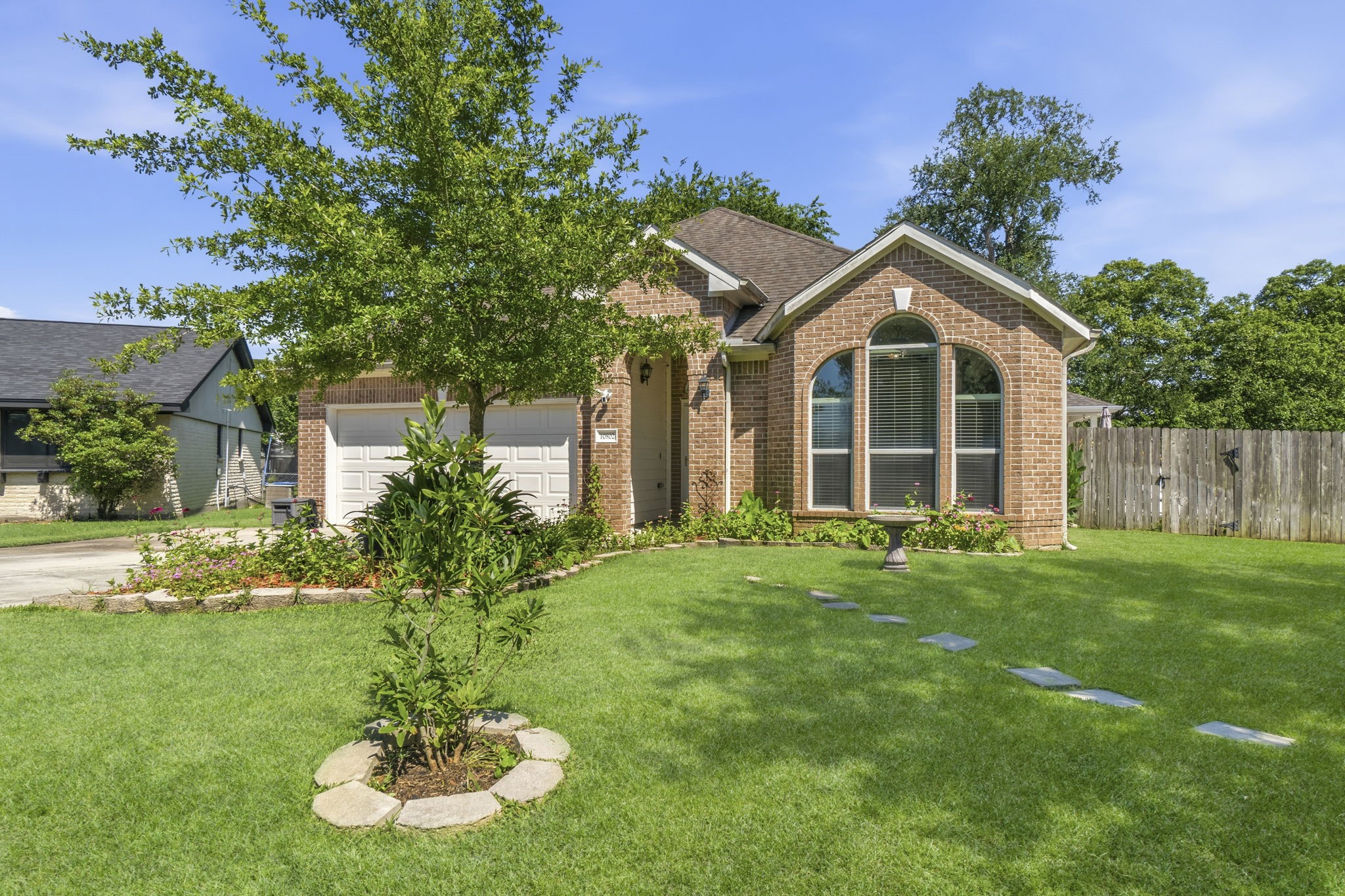 10802 Windswept Montgomery, TX 77356 - Photo 13 of 42 a front view of a house with a yard