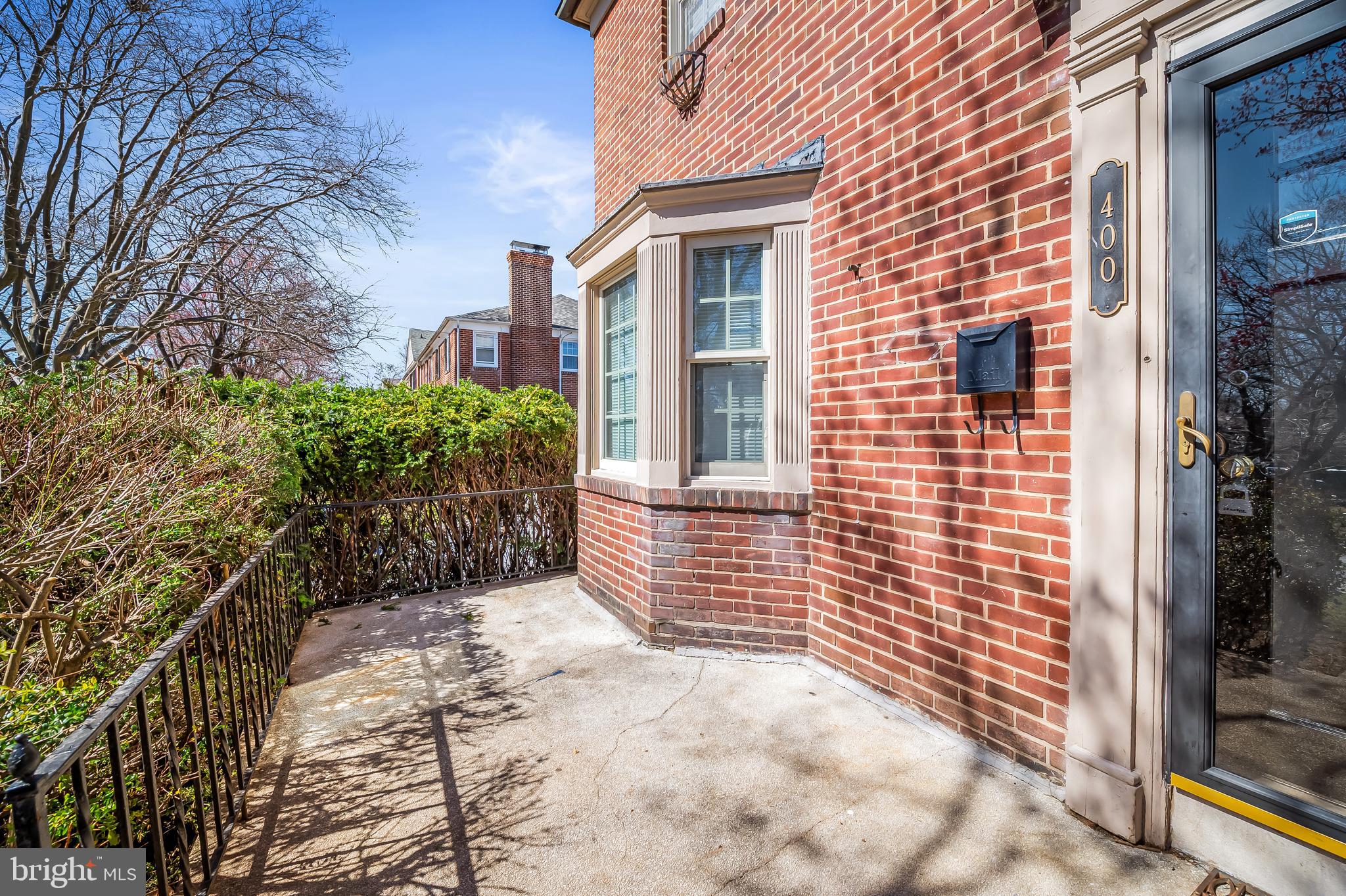 400 Regester Avenue Baltimore, MD 21212 - Photo 2 of 38 a view of a brick house with many windows