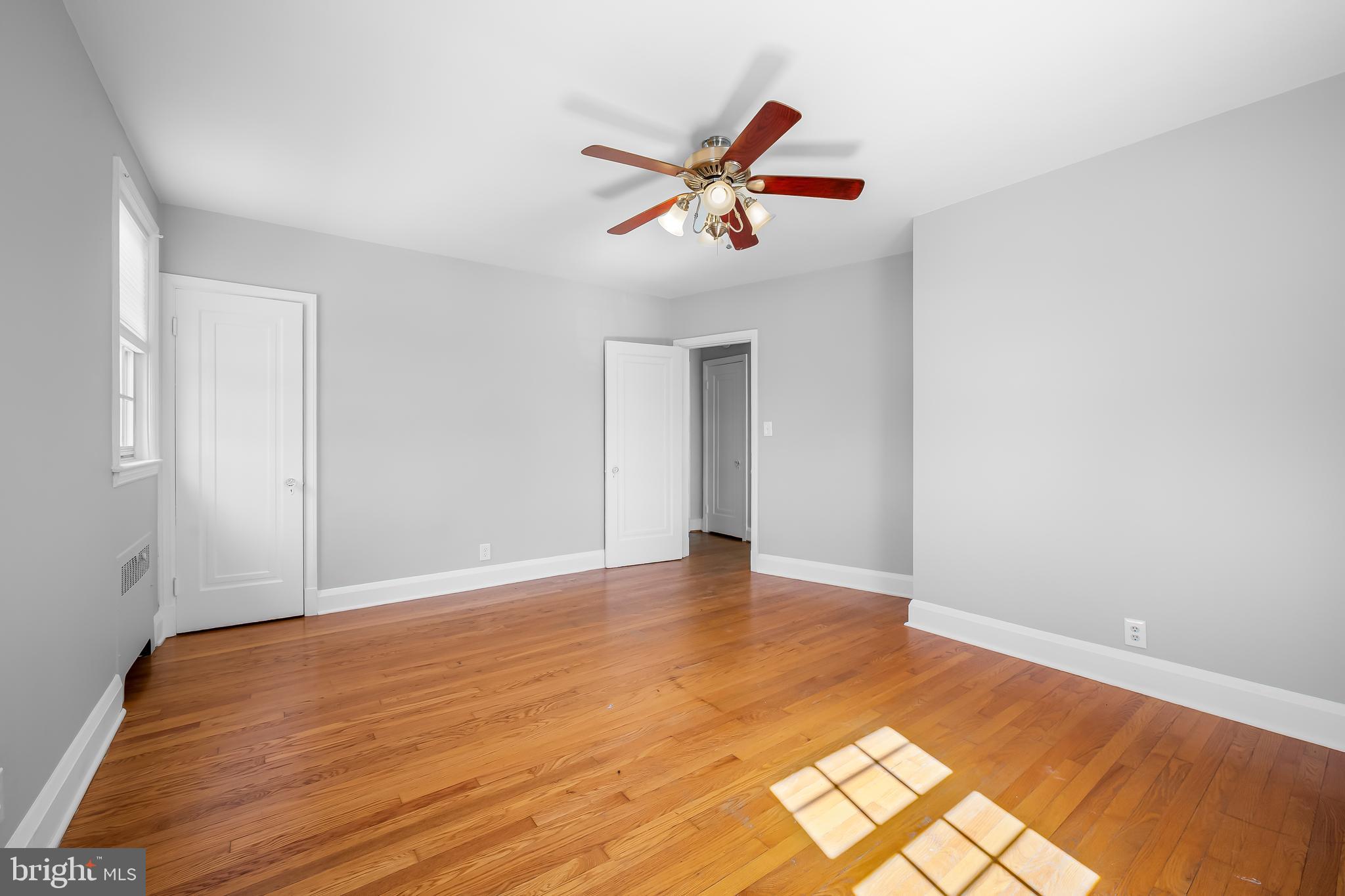 400 Regester Avenue Baltimore, MD 21212 - Photo 23 of 38 a view of empty room with wooden floor