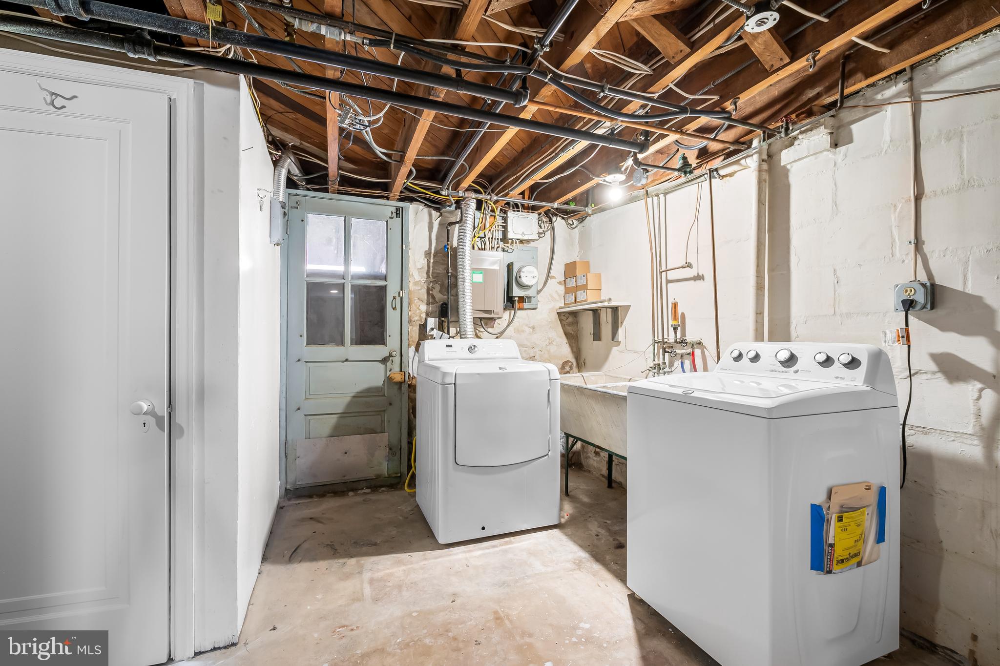 400 Regester Avenue Baltimore, MD 21212 - Photo 28 of 38 a utility room with dryer and washer