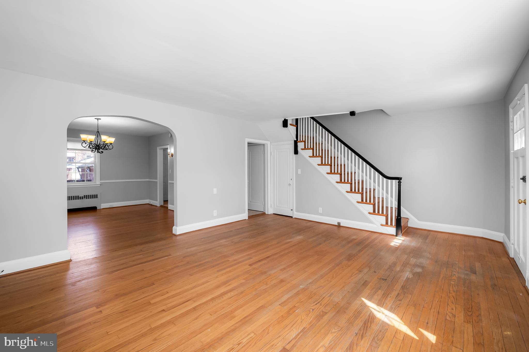 400 Regester Avenue Baltimore, MD 21212 - Photo 6 of 38 a view of empty room with wooden floor