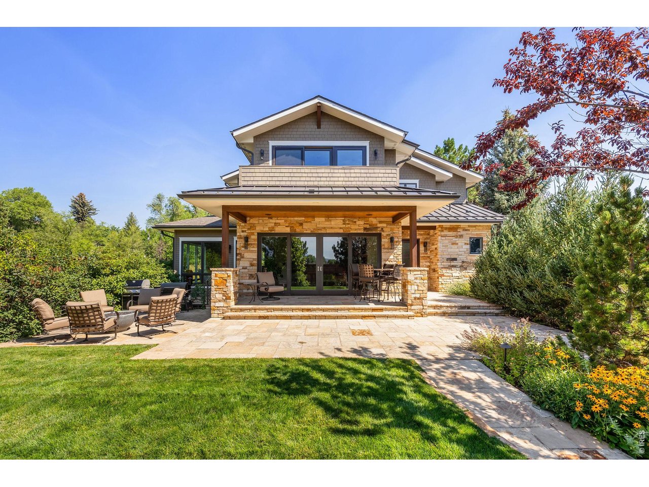 1525 Jennine Place Boulder, CO 80304 - Photo 3 of 50 Large glass sliders extend the living room seamlessly into the outdoors!
