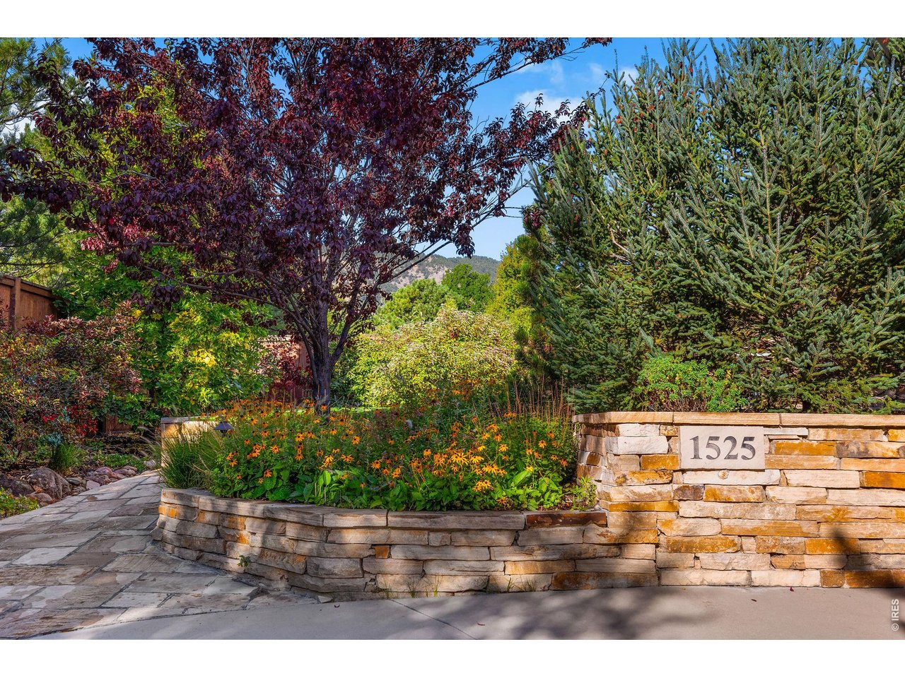 1525 Jennine Place Boulder, CO 80304 - Photo 7 of 50 An elegant entryway surrounded by pristine landscaping