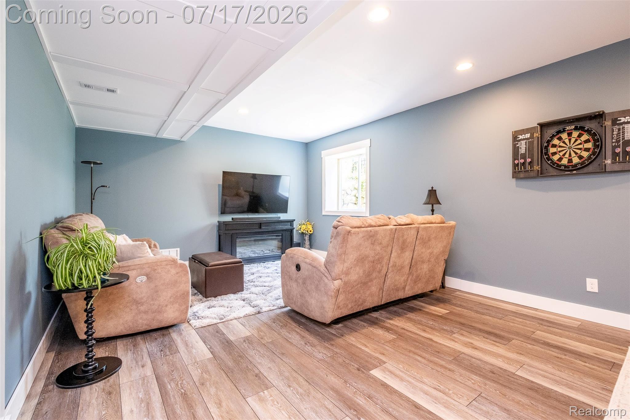 12349 Sugar Maple Drive Fenton, MI 48430 - Photo 37 of 67 Recreation room featuring wood-finish flooring, recessed lighting, and a window with white trim