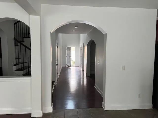a view of gallery with wooden floor