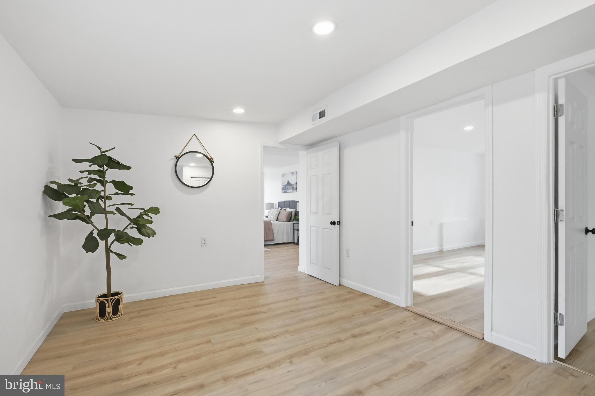 4740 Lake Road Newfield, NJ 08344 - Photo 18 of 29 a view of entryway with wooden floor