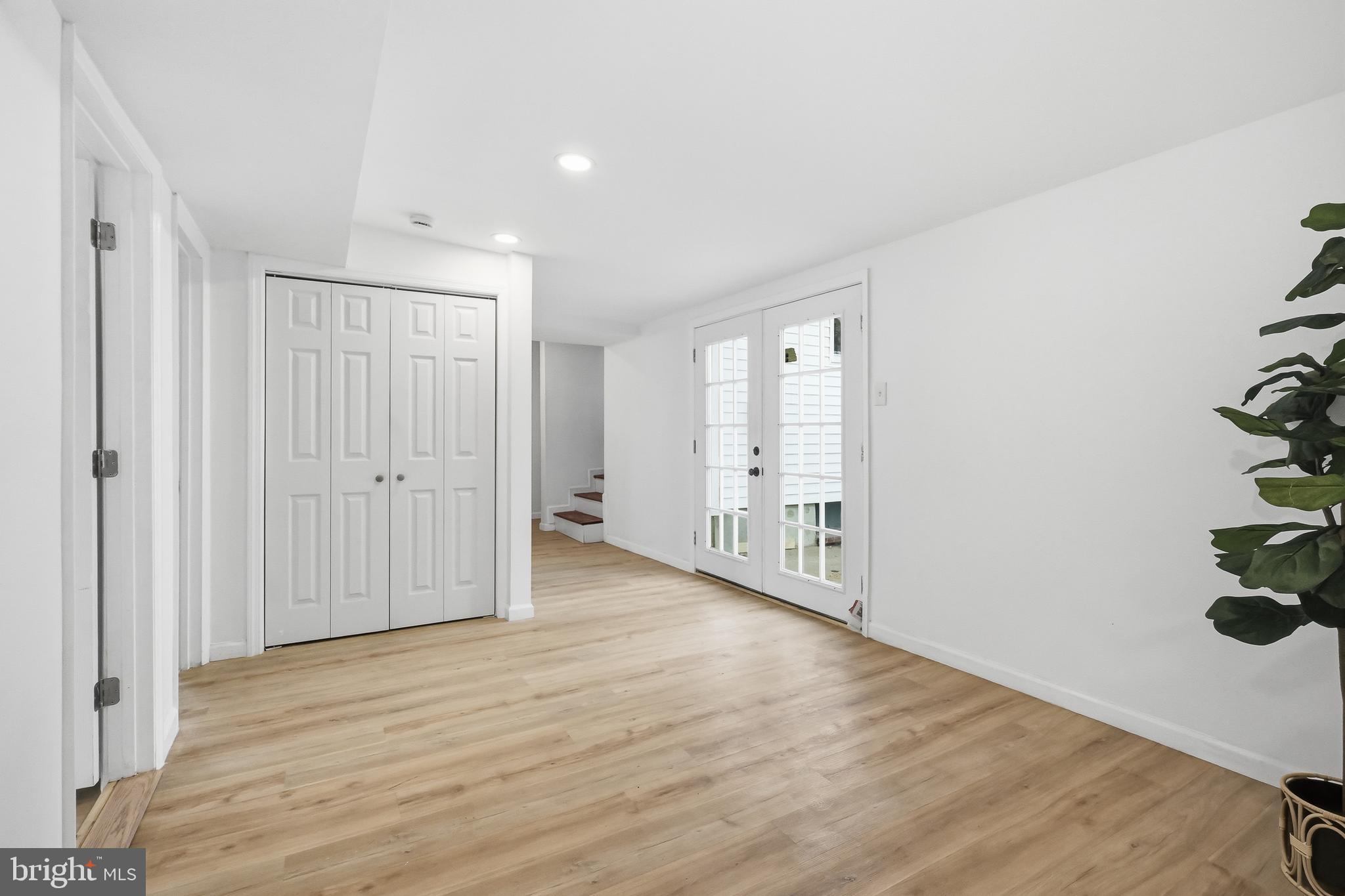 4740 Lake Road Newfield, NJ 08344 - Photo 21 of 29 a view of a hallway with wooden floor