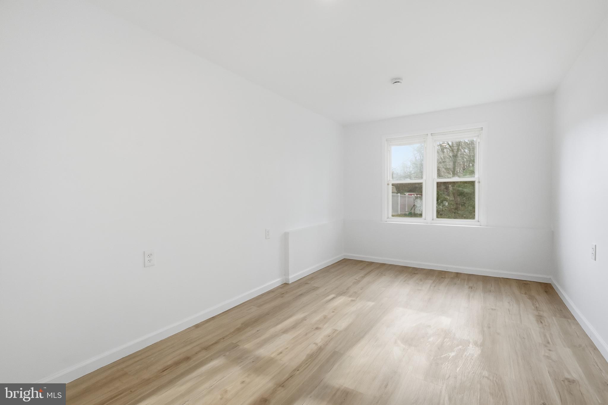 4740 Lake Road Newfield, NJ 08344 - Photo 22 of 29 an empty room with a window