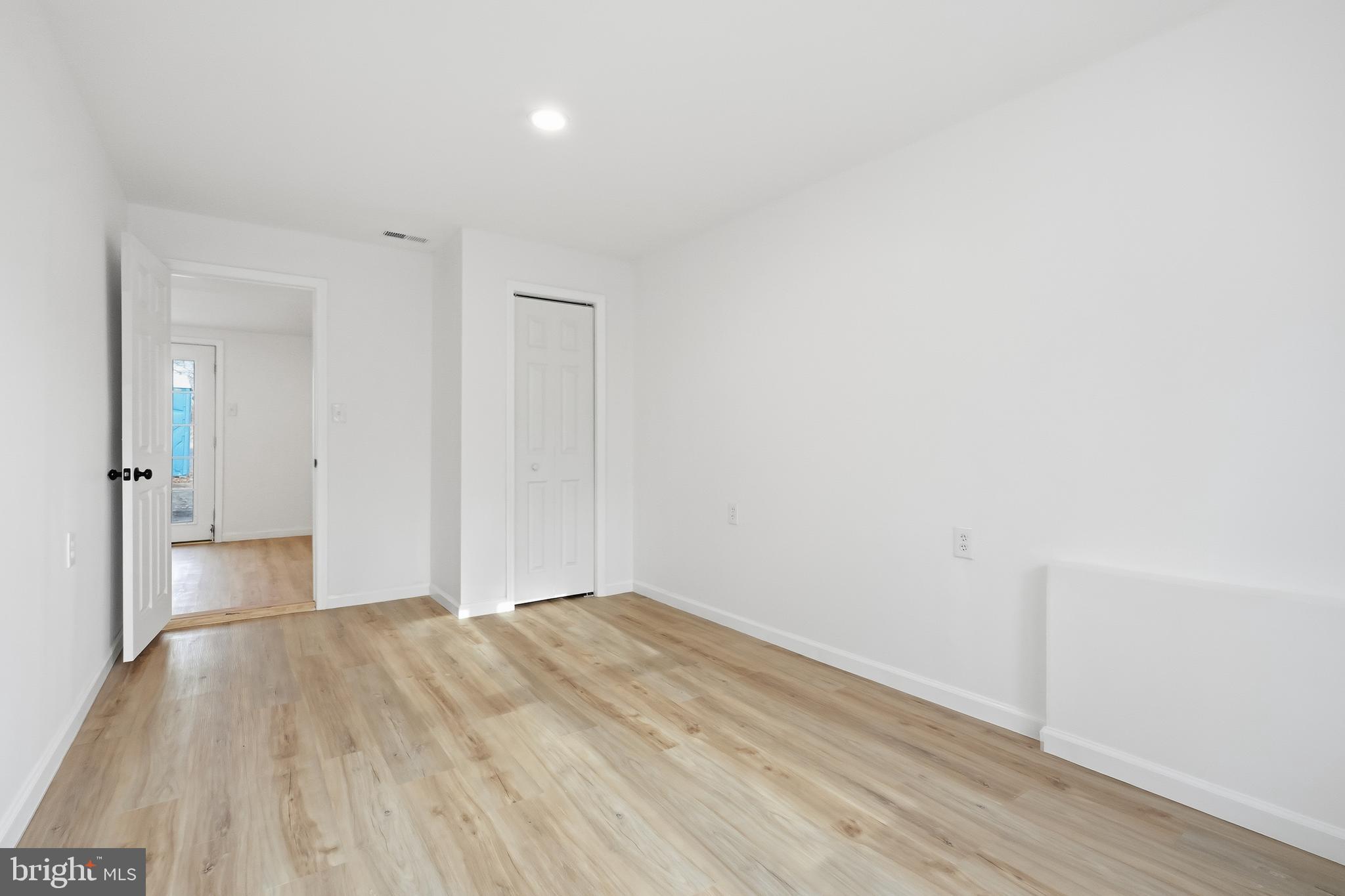 4740 Lake Road Newfield, NJ 08344 - Photo 23 of 29 a view of hallway with wooden floor