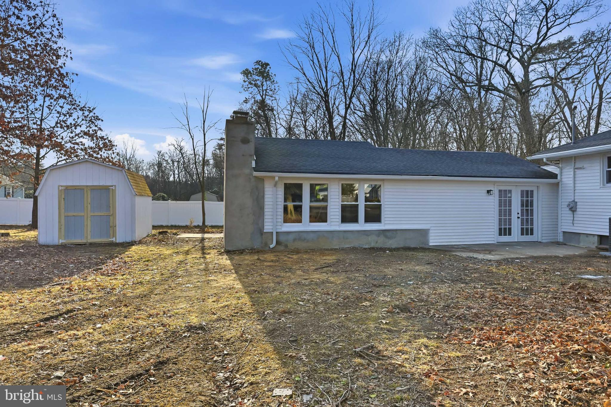 4740 Lake Road Newfield, NJ 08344 - Photo 25 of 29 a view of a yard in front of a house with large tree