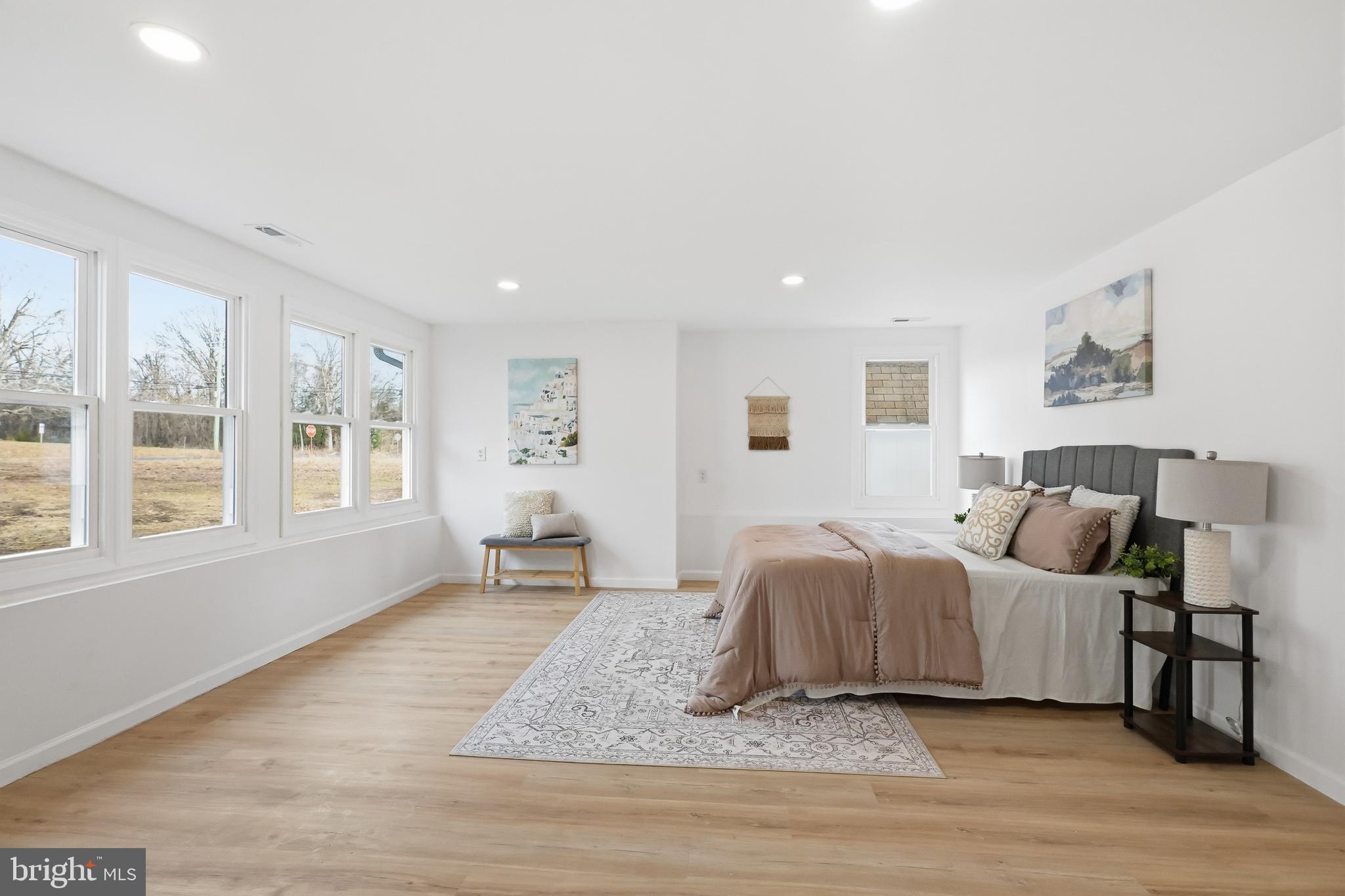 4740 Lake Road Newfield, NJ 08344 - Photo 9 of 29 a living room with a bed furniture and next to a window