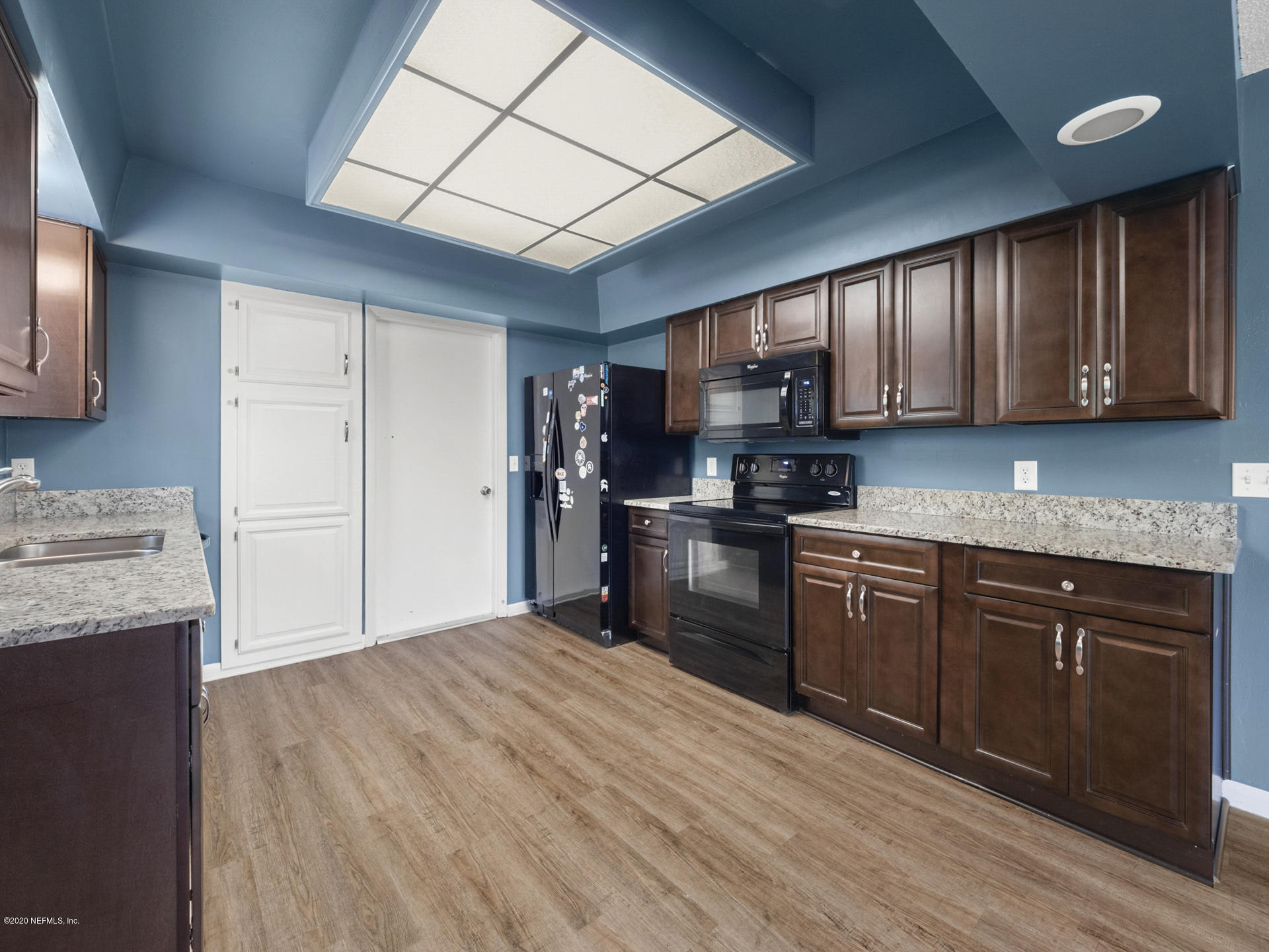 441 Gerona Road St. Augustine, FL 32086 - Photo 11 of 23 Kitchen / Garage Door (Laundry)