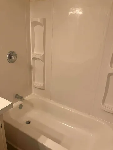 a bathroom with a tub