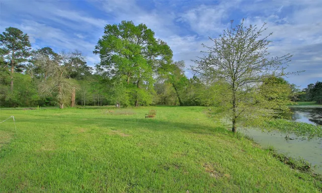 a view of field with green space