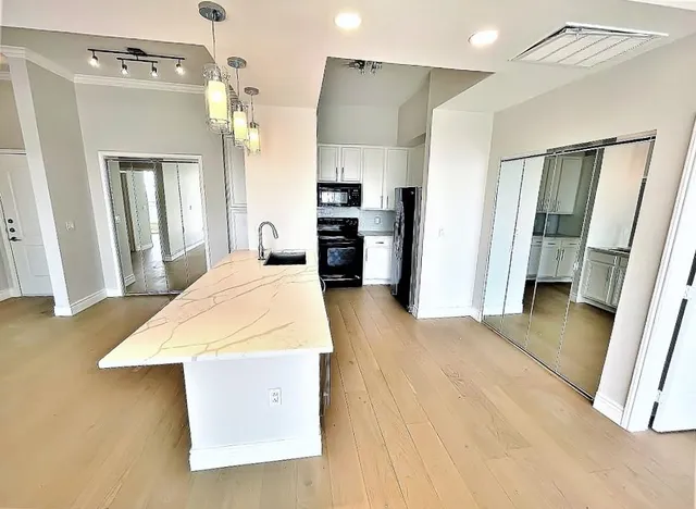 a view of an empty room with a window