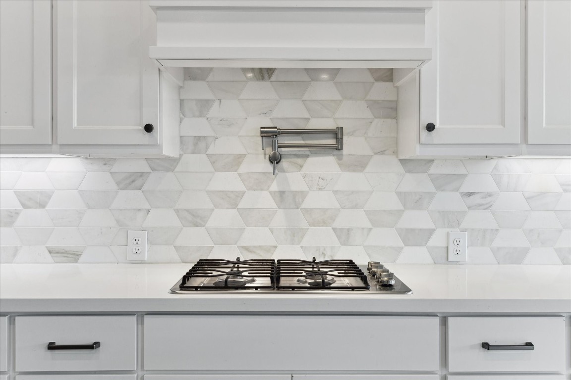 9951 Chapman Trail Manvel, TX 77578 - Photo 15 of 50 a stove top oven sitting inside of a kitchen