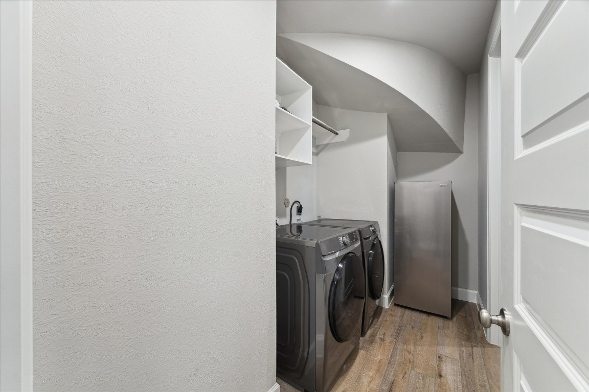 9951 Chapman Trail Manvel, TX 77578 - Photo 25 of 50 a view of a storage and utility room with empty racks