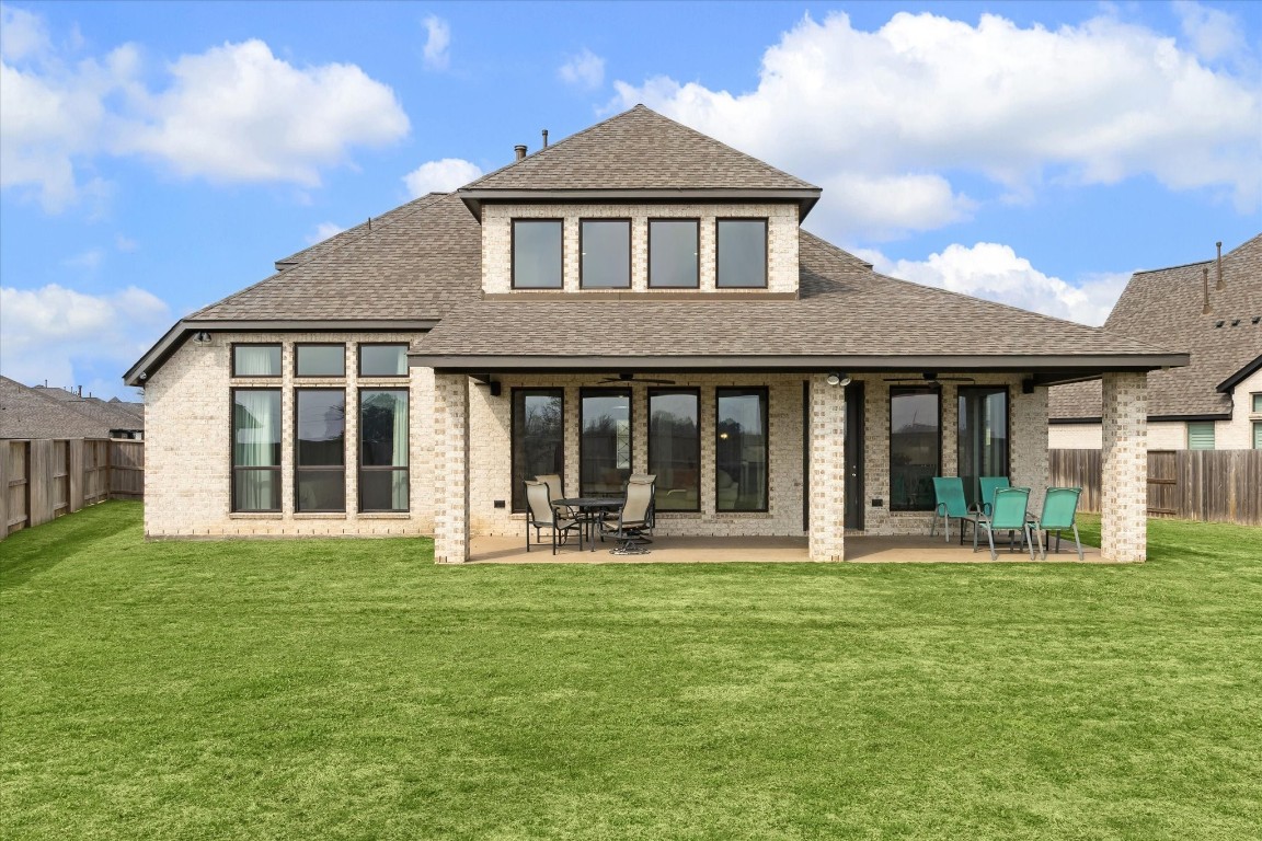 9951 Chapman Trail Manvel, TX 77578 - Photo 39 of 50 a front view of a house with a yard