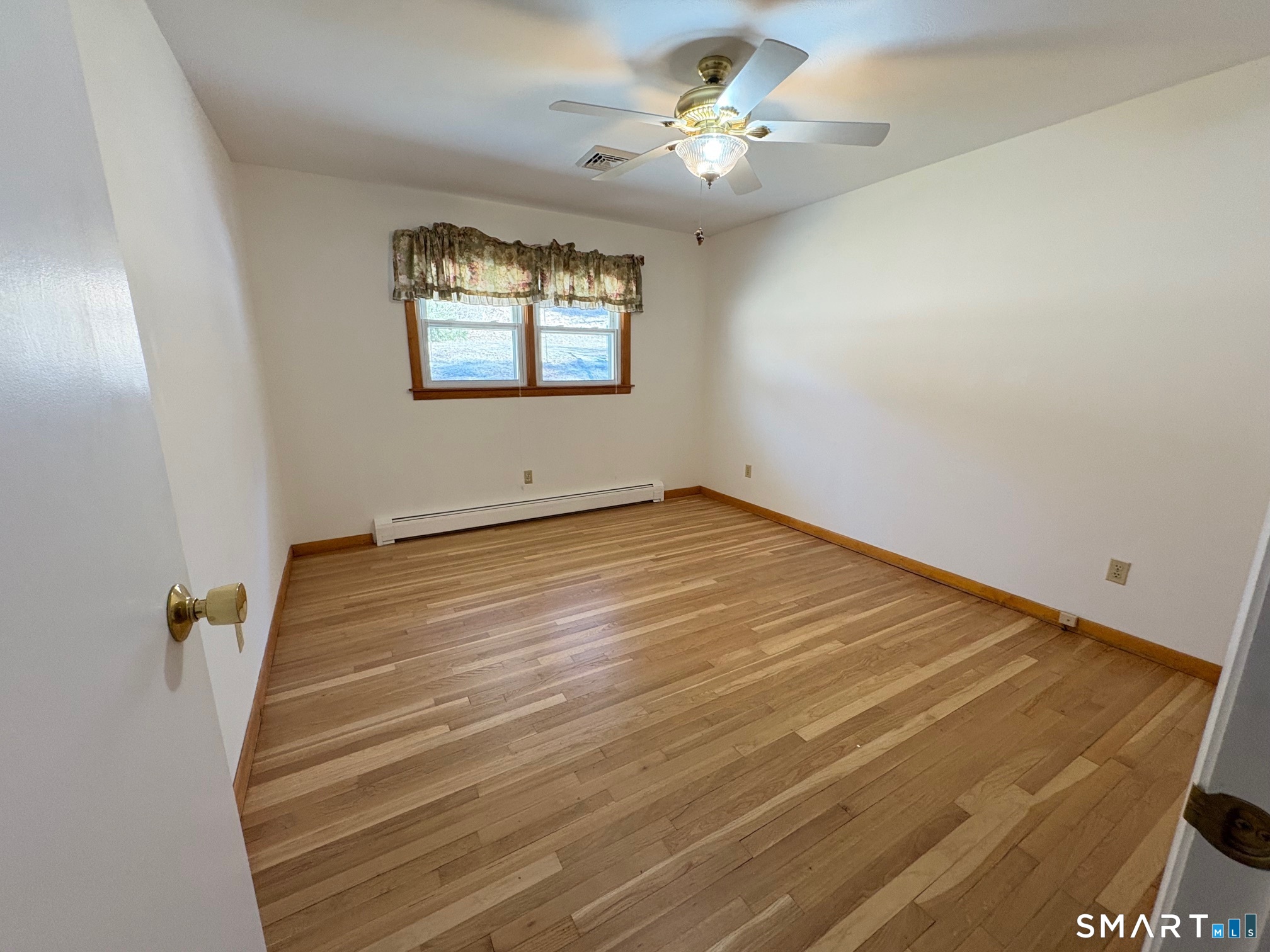 967 Derby-Milford Road Orange, CT 06477 - Photo 22 of 24 wooden floor in an empty room