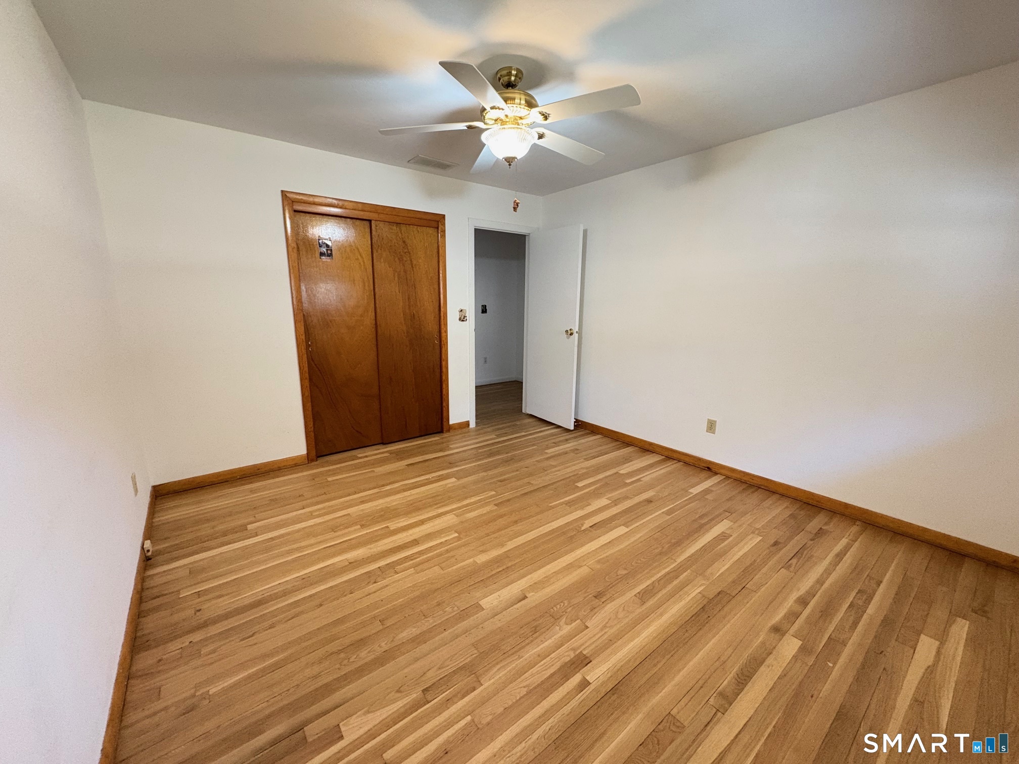 967 Derby-Milford Road Orange, CT 06477 - Photo 23 of 24 a view of a room with a ceiling fan