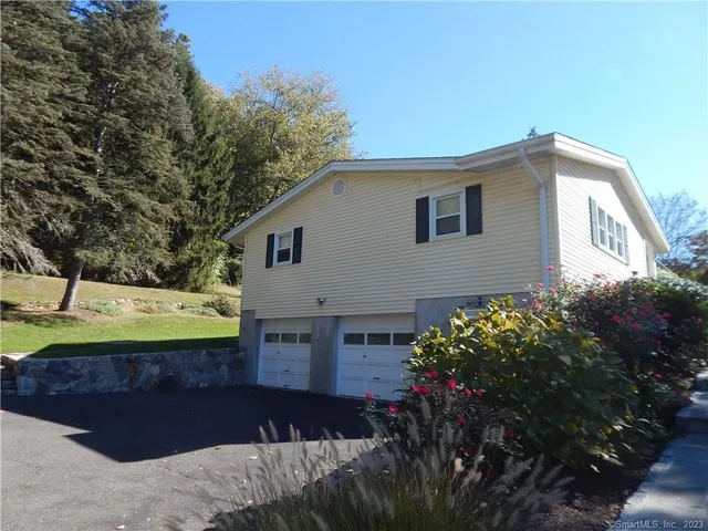 a view of house with outdoor space and entertaining space