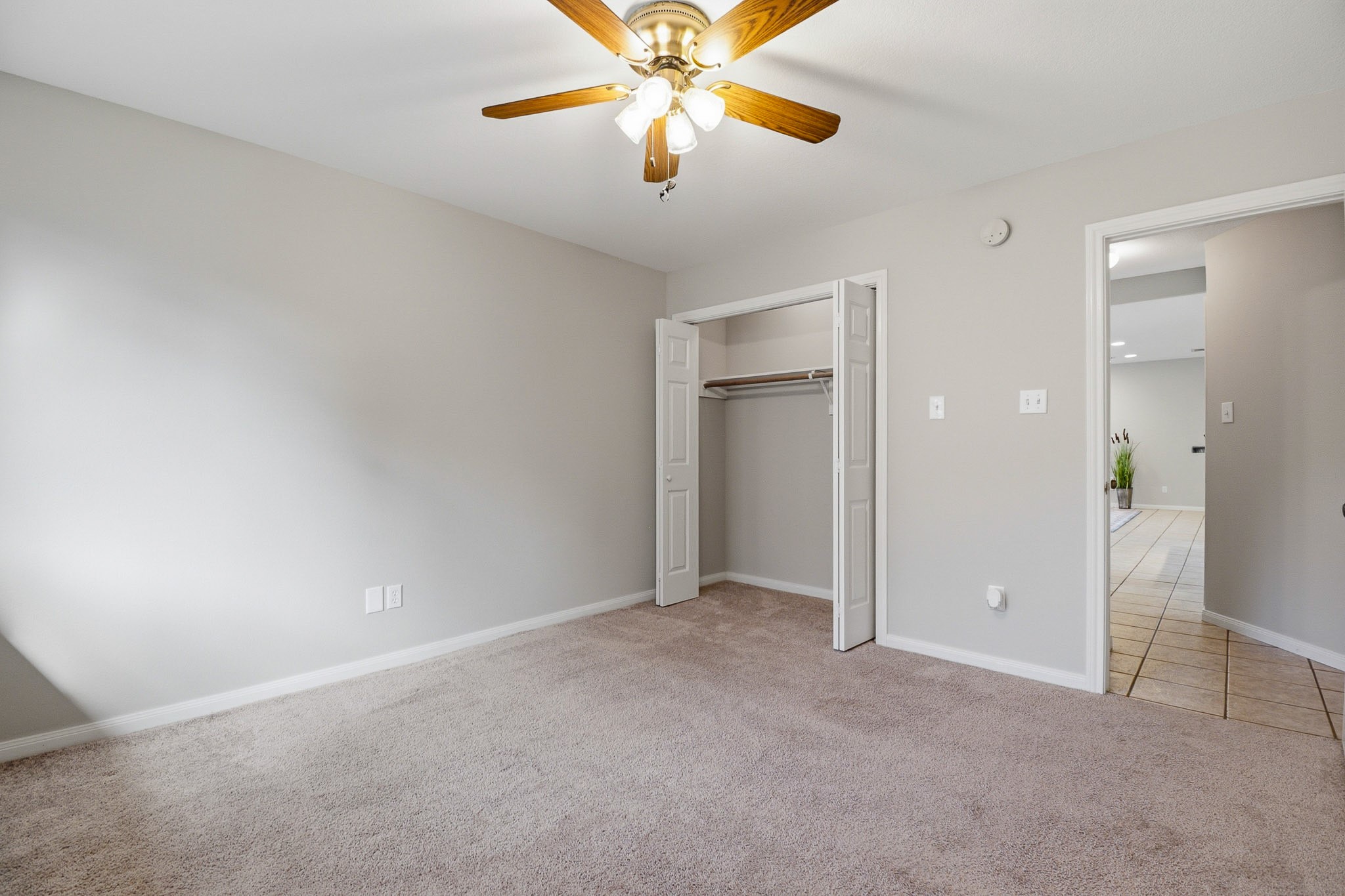 12557 Marina Loop Willis, TX 77318 - Photo 19 of 36 Second bedroom