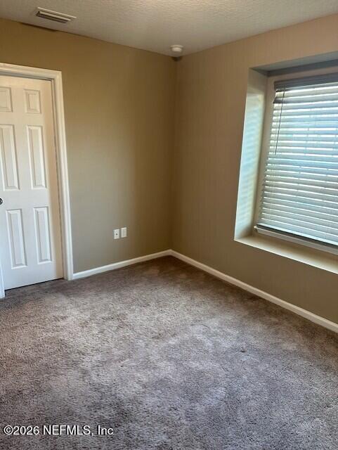 9670 Freefall Road Jacksonville, FL 32221 - Photo 25 of 31 an empty room with a window