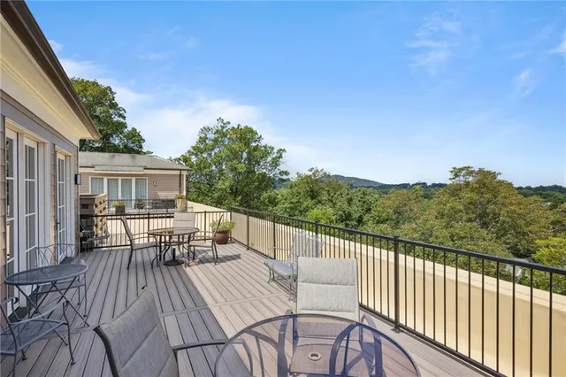 a view of balcony with furniture