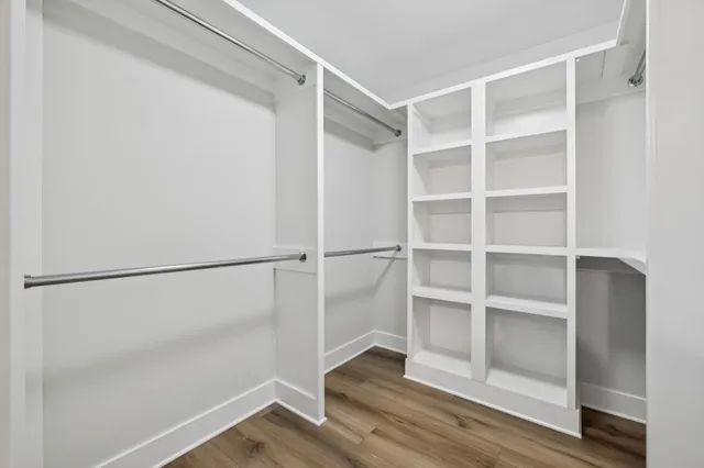 a view of an empty walk in closet
