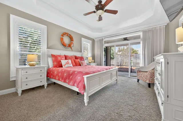 a bedroom with a bed and a chair