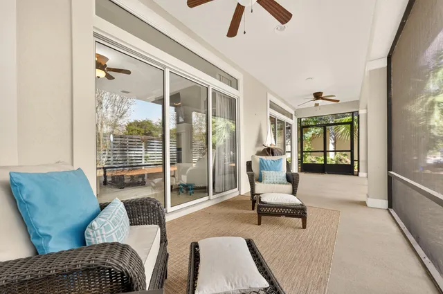 a view of swimming pool with outdoor seating and plants