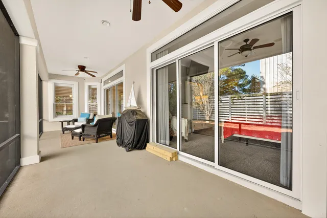 a view of a living room and entry way