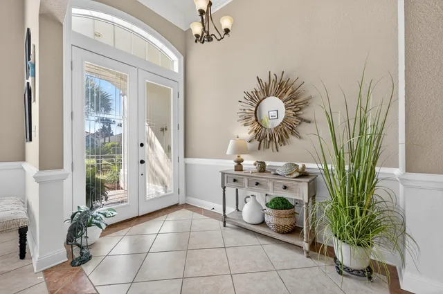 a large kitchen with stainless steel appliances granite countertop a stove sink and cabinets