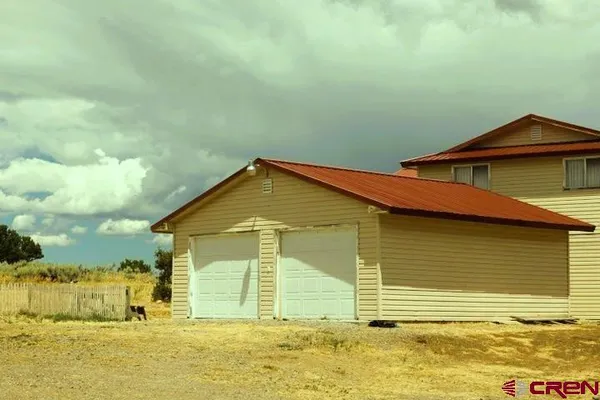 a view of a house with a swimming pool