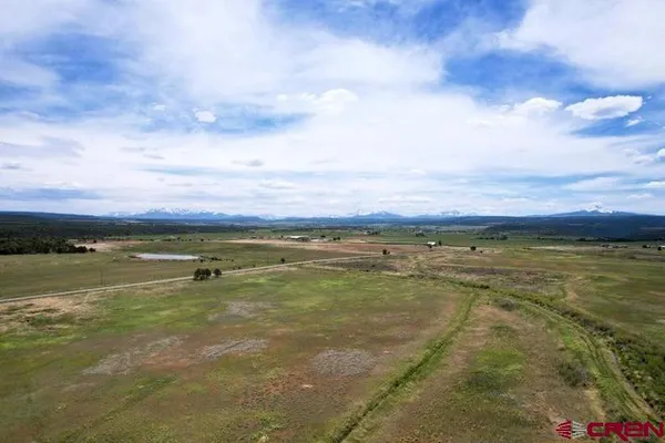 a view of an ocean and mountain